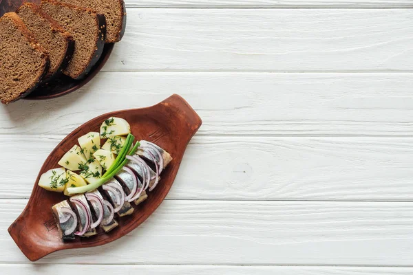 Marinated Herring Potatoes Onions Earthenware Plate Rye Bread Copy Space — Stock Photo, Image