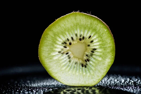 Slice Kiwi Fruit Black Background — Free Stock Photo