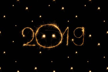 2019 and dots light sings on black background clipart