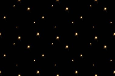 full frame of light dots arranged on black backdrop clipart