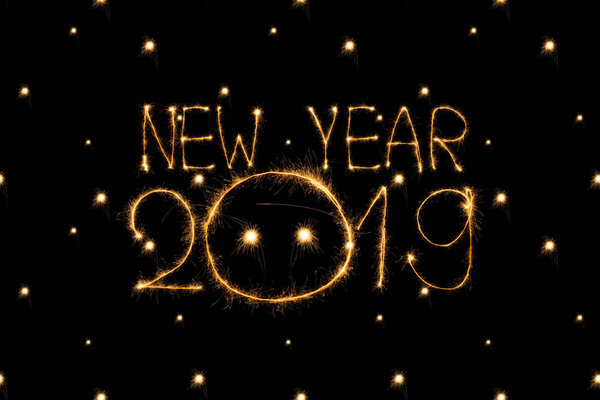 close up view of 2019 new year light sign on black background