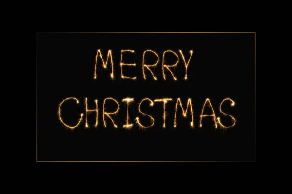 メリー クリスマス ライト黒の背景にレタリングのクローズ アップ表示 — ストック写真