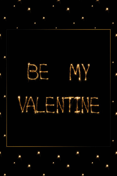 close up view of be my valentine light lettering on black background, st valentines day concept