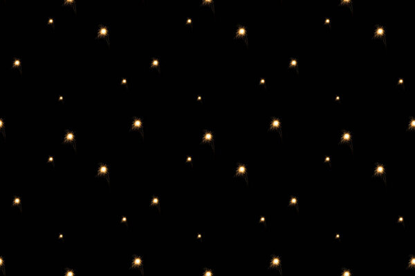 full frame of light dots arranged on black backdrop