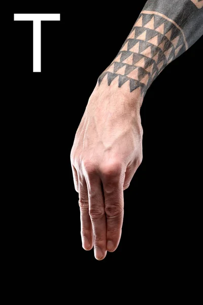 Tattooed Hand Showing Cyrillic Letter Deaf Dumb Language Isolated Black — Free Stock Photo