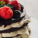 Close-up view of gourmet whoopie pie cake with fresh berries