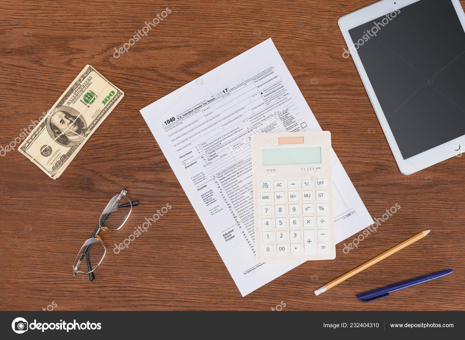 Top View Tax Form Calculator Dollar Banknote Wooden Desk Workplace