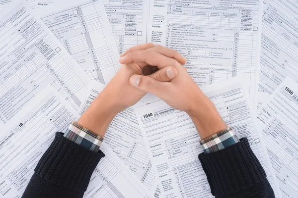 Cropped View Man Folded Hands Background Tax Forms — Stock Photo, Image