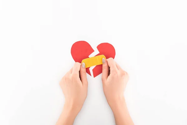 Partial View Woman Holding Broken Red Heart Medical Patch Symbol — Stock Photo, Image