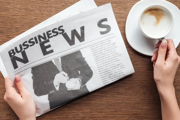 Cropped Image Journalist Holding Business Newspaper Cup Coffee Wooden Table — Stock Photo, Image