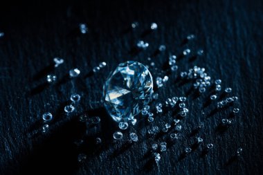 big and small diamonds on dark background clipart