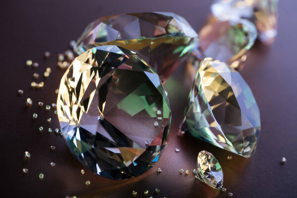 selective focus of pure diamonds on brown background