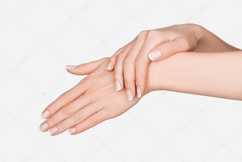cropped view of female hands isolated on white