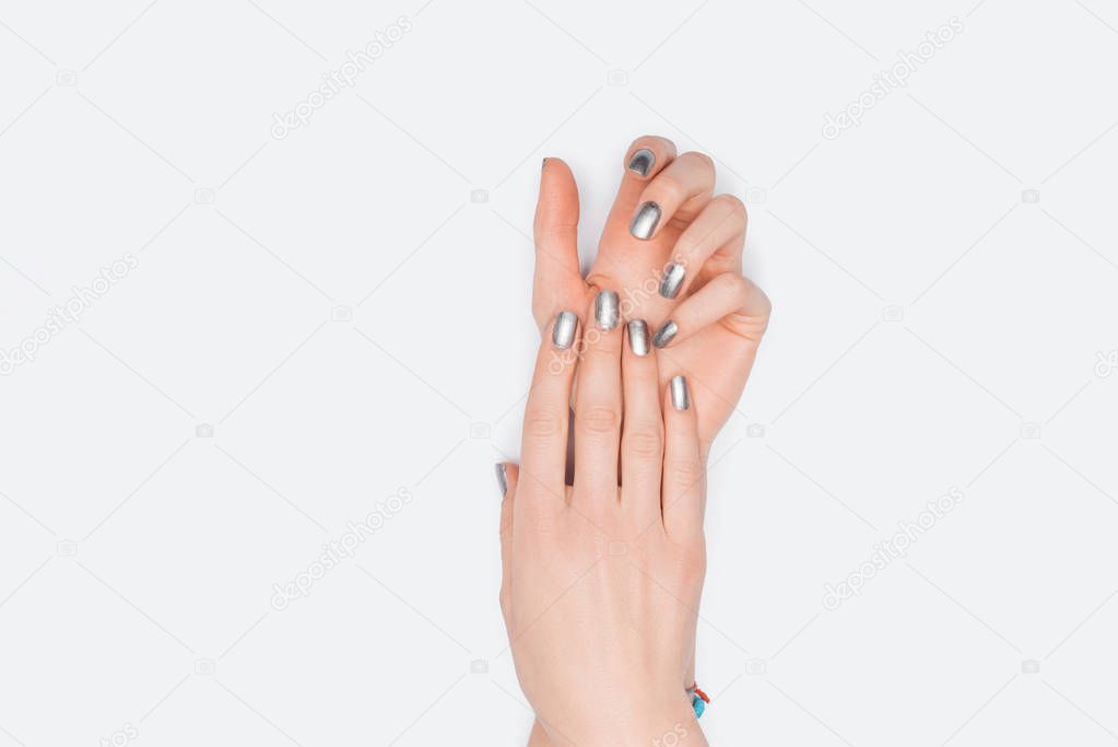 partial view of female hands isolated on white 