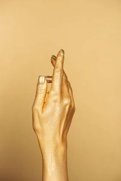 Cropped View Female Painted Hand Golden Background — Stock Photo, Image