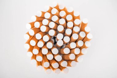 Flat lay with bunch of cigarettes isolated on grey clipart