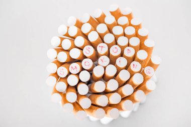 Top view of cigarettes isolated on grey, stop smoking concept clipart
