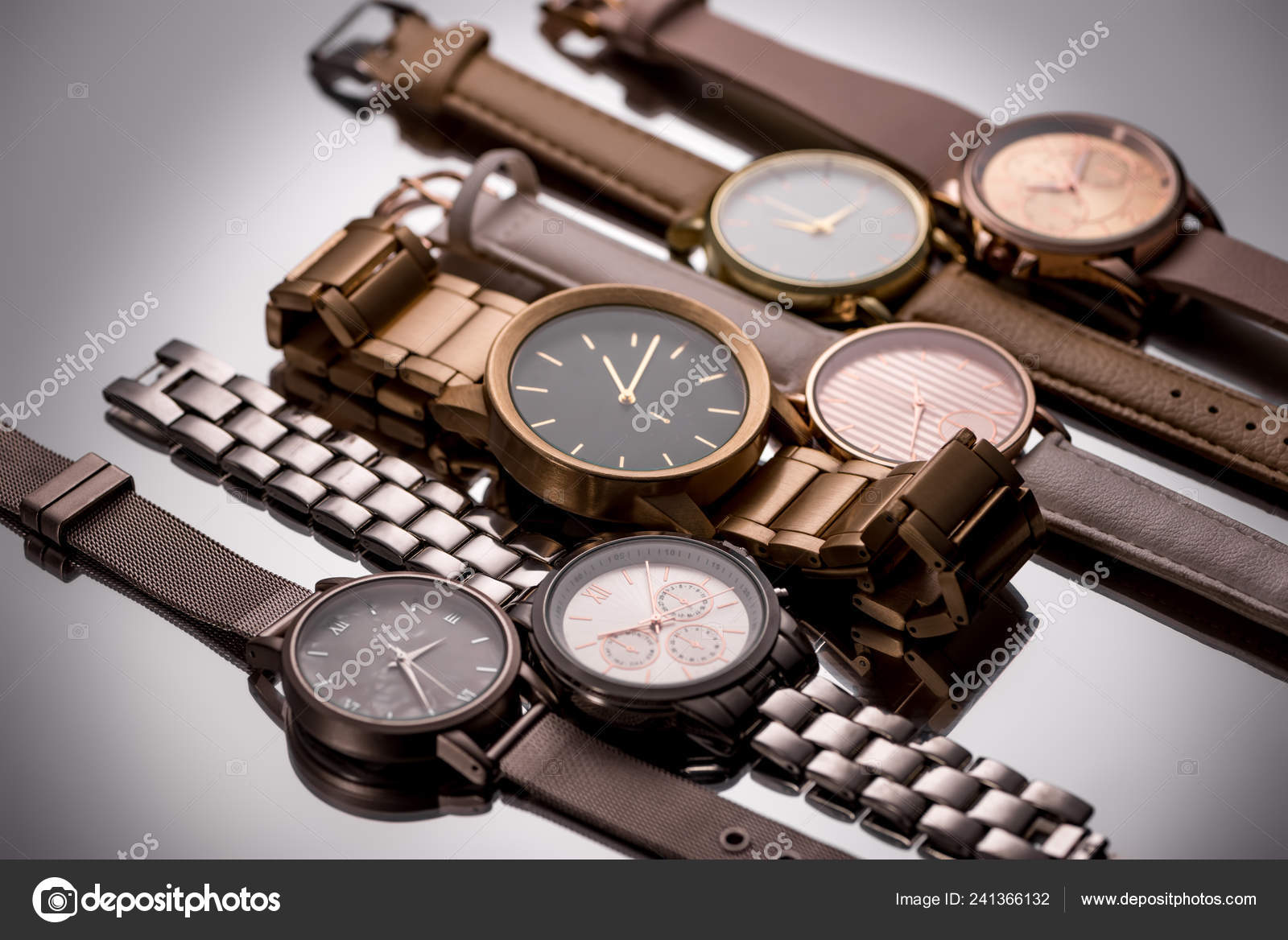 Luxury Wristwatches Clock Hands Lying Grey Background — Stock Photo