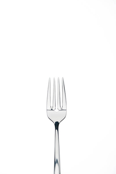 four-prong metal shiny fork isolated on white isolated on white