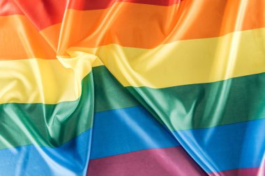 top view of creased rainbow flag, lgbt concept clipart