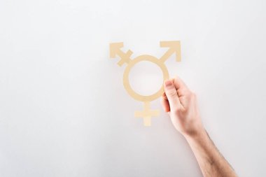 cinsiyet işareti gri arka plan üzerinde lgbt kavramı kesme kağıt ile görünümünü erkek eli kırpılmış