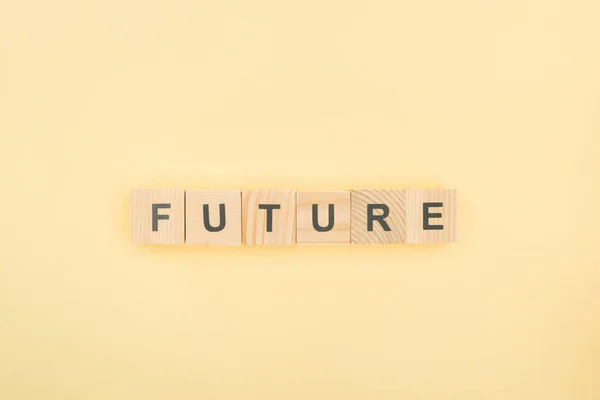 Top View Future Lettering Made Wooden Cubes Yellow Background — Stock Photo, Image