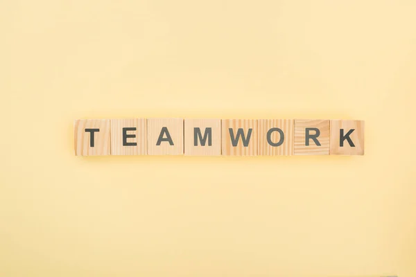 Top View Team Work Lettering Arranged Wooden Blocks Yellow Background — Stock Photo, Image