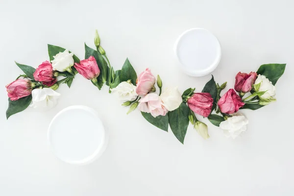 Top View Composition Eustoma Beauty Cream Bottles White Background — Stock Photo, Image