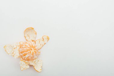 top view of ripe orange tangerine with peel on white background clipart