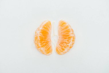 top view of peeled tangerine slices on white background with copy space clipart