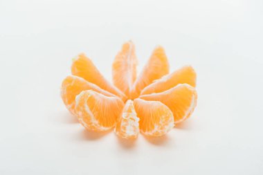 ripe orange tangerine slices arranged in circle on white background clipart