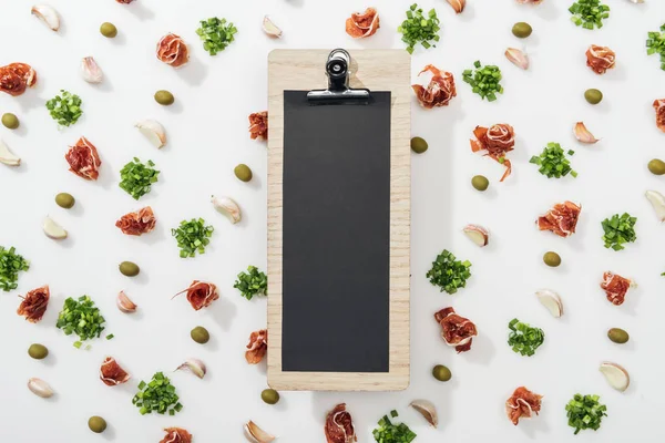 Top View Empty Clipboard Prosciutto Olives Garlic Cloves Greenery — Stock Photo, Image