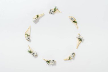 top view of sliced pears with blue cheese and rosemary twigs on white background clipart