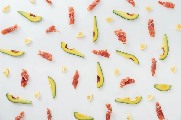 Top View Prosciutto Sliced Avocados Lemons White Background — Stock Photo, Image