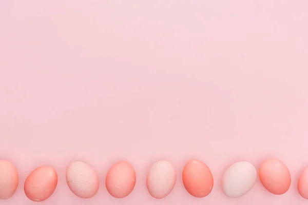Top View Traditional Pastel Easter Eggs Row Isolated Pink Copy — Stock Photo, Image