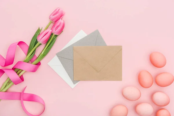 Top View Greeting Envelopes Tulips Easter Eggs Isolated Pink — Stock Photo, Image