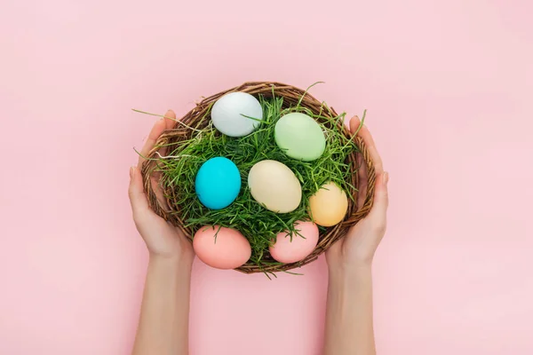 Cropped View Female Hands Holding Wicker Plate Grass Easter Eggs — Stock Photo, Image