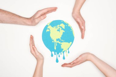 paper cut melting earth surrounded by male and female hands on white background, global warming concept clipart