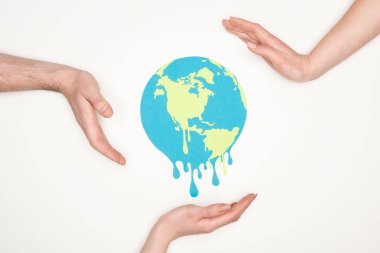 cropped view of male and female hands around paper cut melting globe on white background, global warming concept clipart