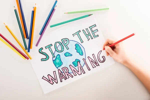 Cropped View Woman Writing Stop Warming Card Globe Sign Multicolored — Stock Photo, Image