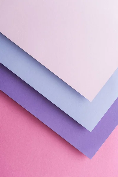 Bovenaanzicht Van Blauw Wit Paars Vellen Papier Roze Achtergrond Met — Stockfoto