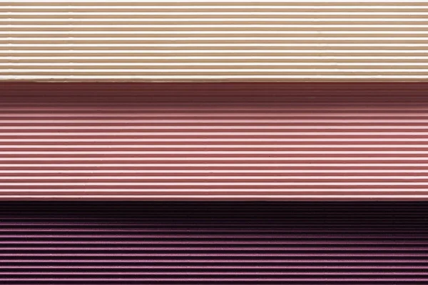 close up of white pink and purple papers with copy space 