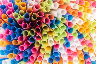 close up of colorful and bright plastic straws with copy space  clipart