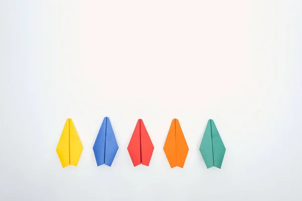 Flat Lay Colorful Paper Planes White Surface — Stock Photo, Image