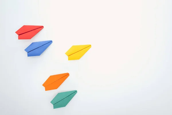 Flat Lay Colorful Paper Planes White Surface — Stock Photo, Image