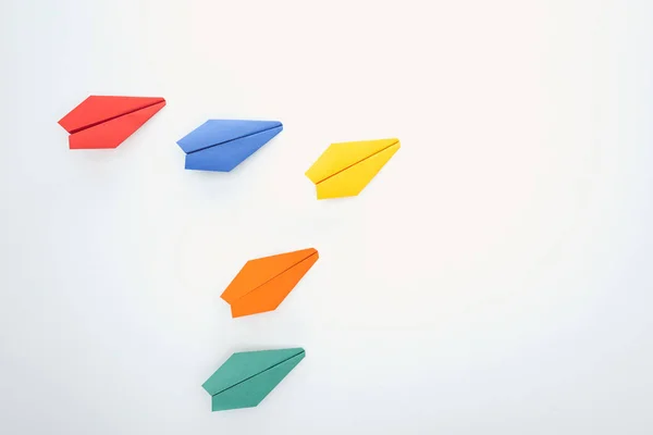 Flat Lay Colorful Paper Planes White Surface — Stock Photo, Image