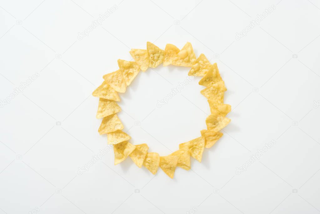 top view of tasty nachos on white background with copy space 
