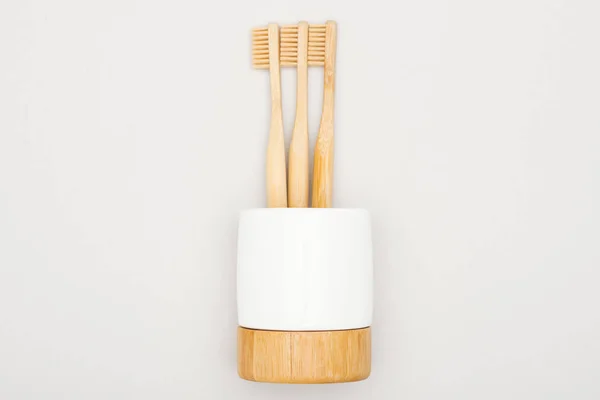 Natural Bamboo Toothbrushes Stand Grey Background — Stock Photo, Image