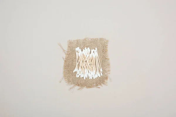 Top View Cotton Swabs Brown Sackcloth Grey Background — Stock Photo, Image
