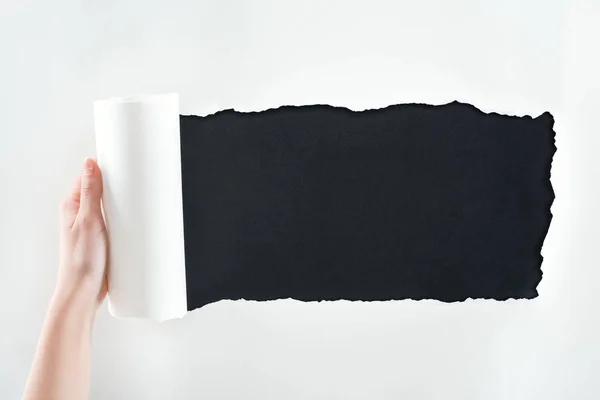 Cropped View Woman Holding Textured White Paper Rolled Edge Black — Stock Photo, Image